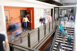 high school hallway WEB 300x200 Historic amounts of funding flowing to K 12 school campuses