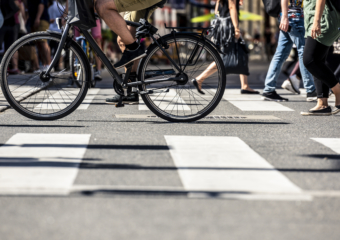 pedestrian bike crossing WEB 340x240 Cities, counties launching projects to reach sustainability goals